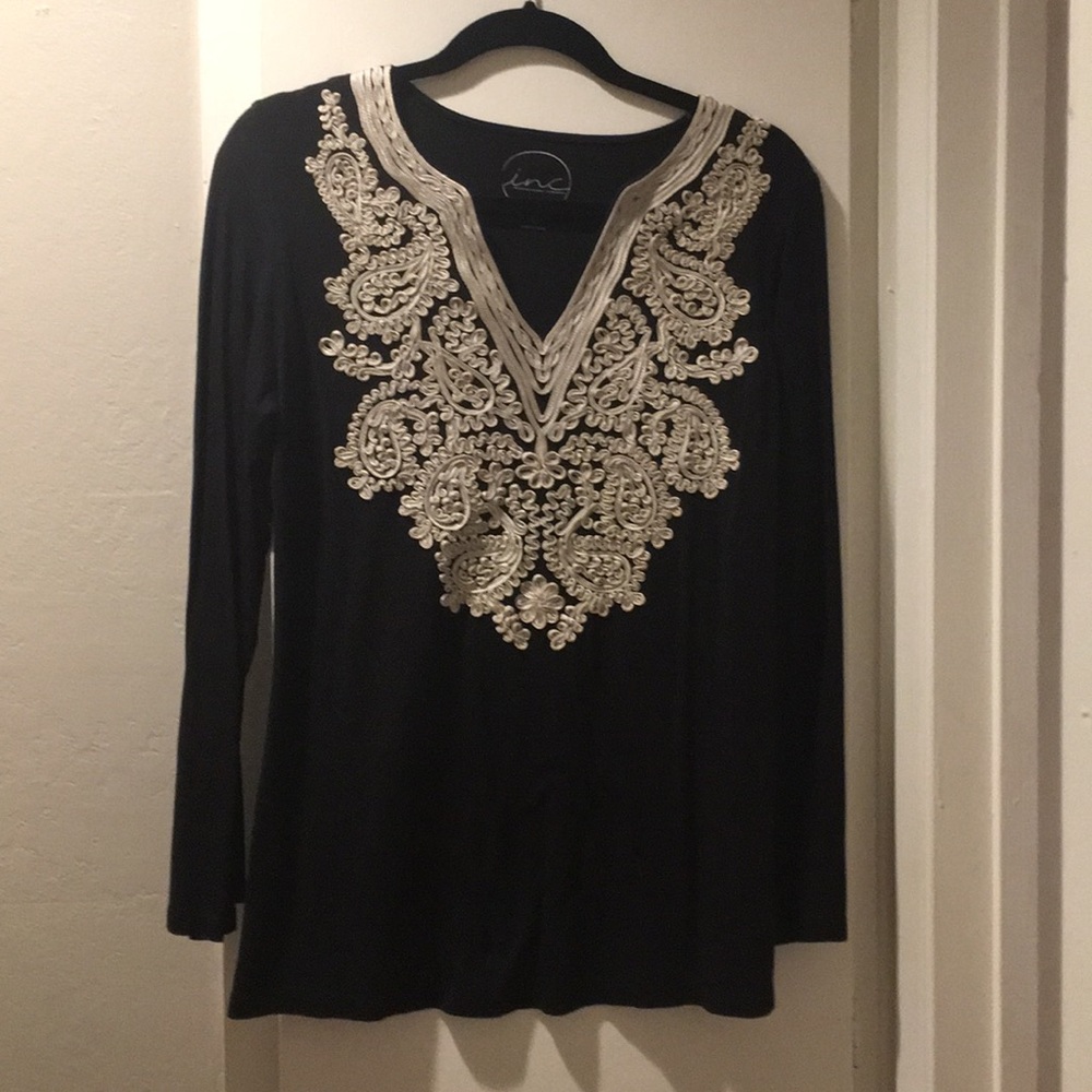 Beautiful black blouse with white embroidery